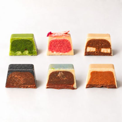Raw Chocolate Gift (6 Pieces) — <em data-start="32" data-end="51">Harmony Above All</em><br data-start="51" data-end="54" data-is-only-node="">Circulate, Open, and Align: Yin-Yang Five Elements Chocolates<br data-start="115" data-end="118">Includes Gift B